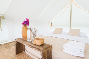 Inside a large white tent camp