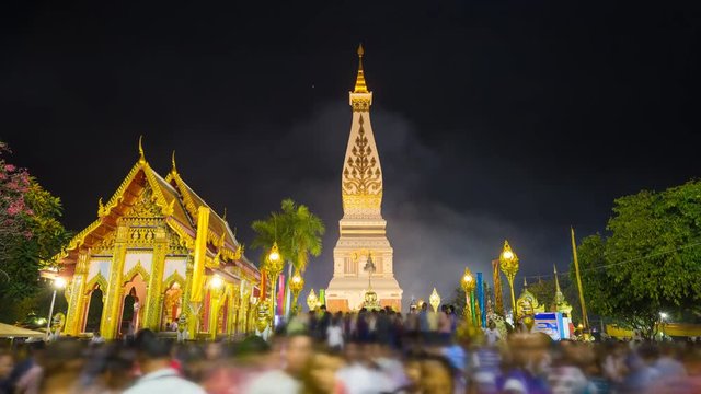 4k Time-lapse of Unidentified blured people ceremony to worship the beautiful at Wat Phra That phanom festival of year