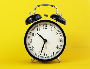 classic table clock on a yellow background. interior Features