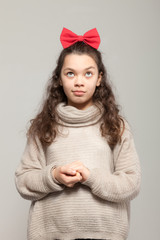 Girl with red bow