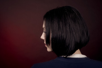 Fototapeta premium Close-up portrait of girl with short dark hair