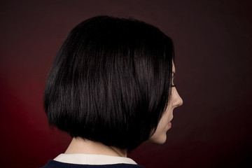 Close-up portrait of girl with short dark hair