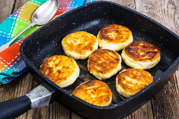 Cheesecakes fried on a grill pan