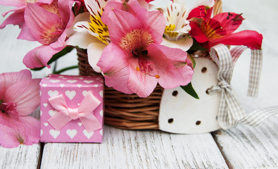 pink alstroemeria with gift box