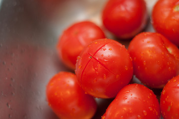 Fresh tomatoes in kitchen