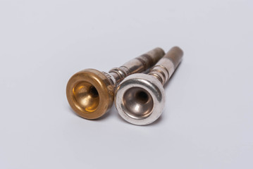 trumpet mouthpiece on white background