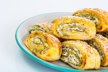 Sweet yeast rolls with cheese and poppy seeds