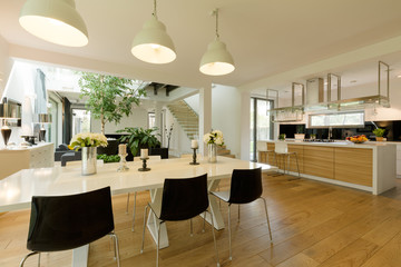 Dining room with white table and black chairs