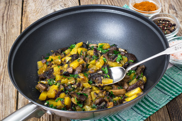 Mixed vegetables with mushrooms in pan