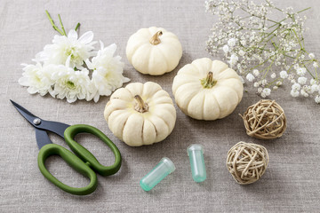 How to make floral decoration with white pumpkins called baby bo