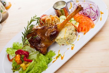 duck leg with vegetable salad