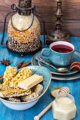 Kozinaki with seeds, nuts, sesame seeds and honey