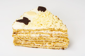 Honey cake with whipped cream and white chocolate