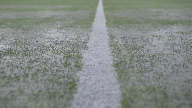Rain on a soccer camp

Rain shooting of a football field