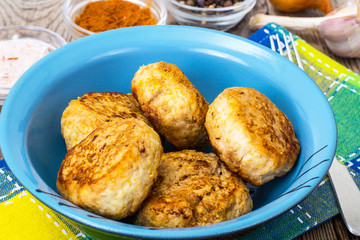 Cutlets in a ceramic bowl