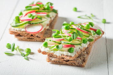Fresh crispy bread with crunchy bread, fromage cheese and avocado