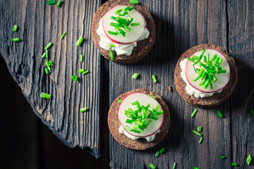 Tasty pumpernickel bread with chive and cottage cheese
