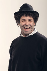 Smiling man with a black hat