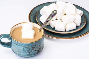 White marshmallow and coffee with milk
