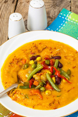 Spicy vegetable cream soup with vegetables