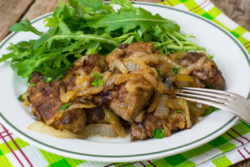 Calf's liver with arugula garnish