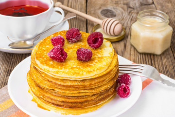 Lush and tender Pancake with berries in sugar