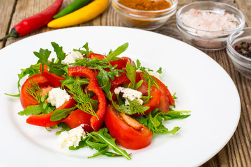 Vegetable salad with arugula and goat cheese