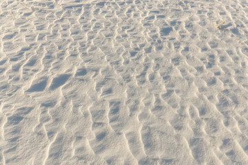 snow dunes in the field. background white