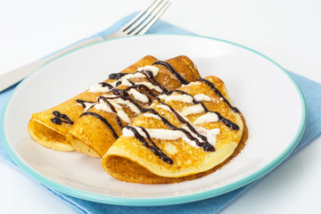 Pancake with chocolate and butter cream