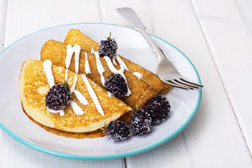Pancake thin fried with blackberry
