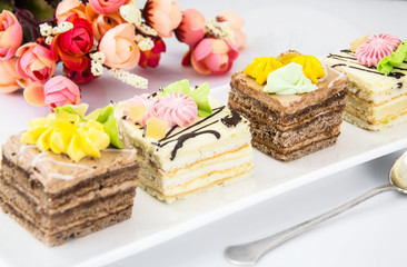 Sweets Cream Cakes on Plate