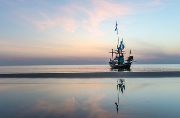 Fishing boats in the morning at sunrise.