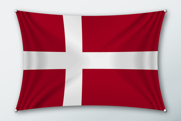 Denmark national flag. Symbol of the country on a stretched fabric with waves attached with pins. Realistic vector illustration.