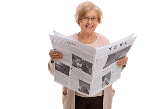 Mature woman holding a newspaper