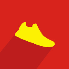 Stylish sneaker for training  with shadow on red background