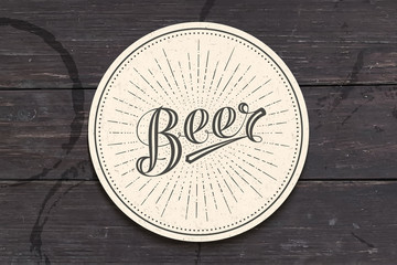 Coaster for beer with hand-drawn lettering Beer. Monochrome vintage drawing for bar, pub and beer themes. White circle for placing beer mug and bottle over it with lettering. Vector Illustration - obrazy, fototapety, plakaty