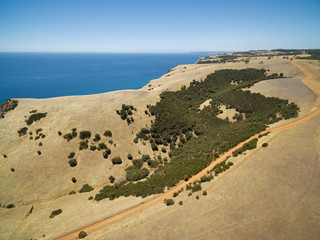 Unsealed rural road and ocean aerial view. Kangaroo Island, South Australia
