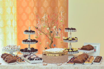 Candy shape cakes covered with coconut flakes