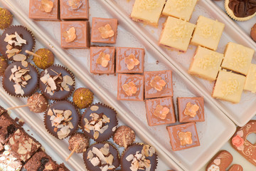 Decorated tree with macaroons and candy shaped cakes