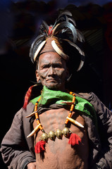 Portrait of the warrior from the tribe of Konyak headhunters in the Nagaland state, India