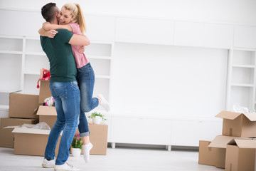 happy Young couple moving in new house