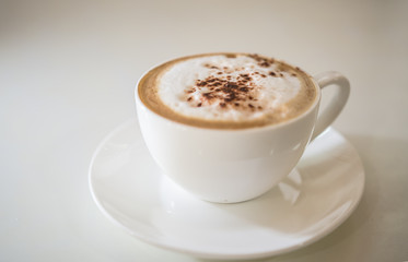 Barista making a cup of coffee soft focus image .
