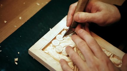 Woodcarving on a wooden board