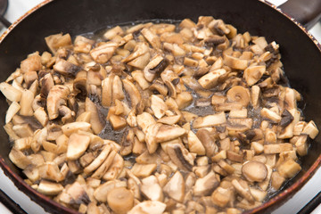 mushrooms fried in a pan