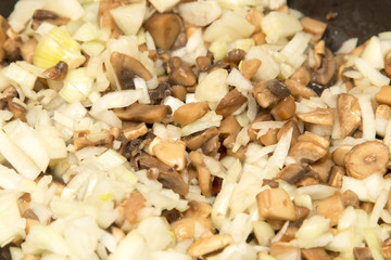 mushrooms fried in a pan