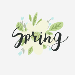 Fototapeta premium Spring. Vector ink illustration with handwritten text and flower and leaves in the background. Season's greetings.