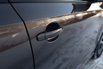 external handle of opening of a car door close-up