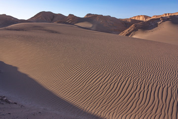 Fototapeta na wymiar texture of sandy dunes in Death Valley in Chile