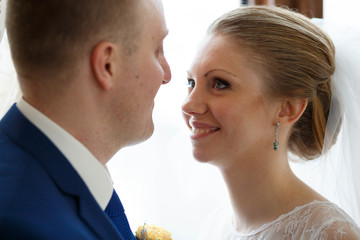 nice portrait of beautiful bride and groom in a restaurant