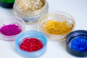 sequins in tubes makeup